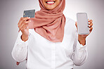 Woman, credit card and phone screen for online shopping, muslim fashion marketing and e commerce in studio. Islamic customer in hijab, mobile mockup and banking app for payment on a white background