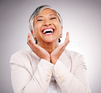 Buy stock photo Portrait, smile and a mature business woman laughing in studio on a gray background for manager or growth. Pride, corporate and face frame with a funny professional looking confident in a suit