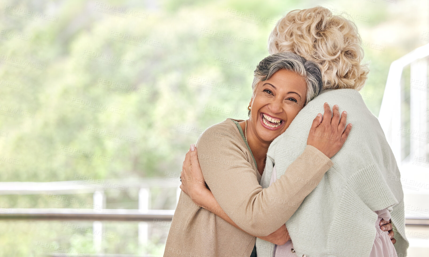 Buy stock photo Love, hug and old woman friends on space together for a visit during retirement in a senior home. Portrait, smile and happy elderly people embracing for support, unity or solidarity while bonding 