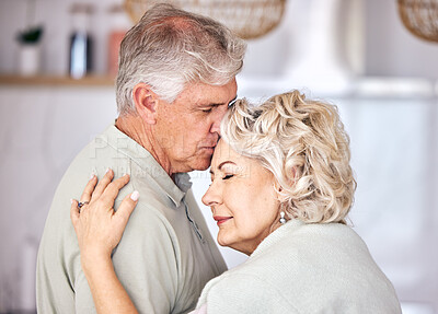 Buy stock photo Hug, support and forehead kiss by senior couple with love, security and comfort in their home. Romance, retirement and elderly man embrace old woman with soulmate, connection and intimacy in a house