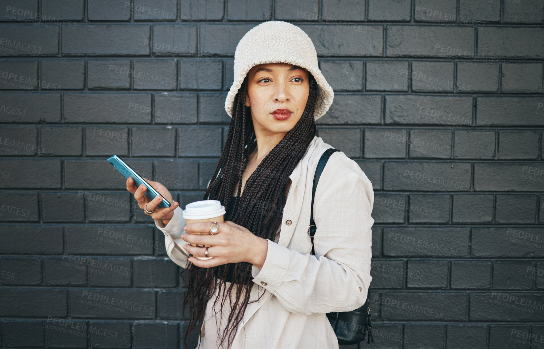 Buy stock photo City, thinking and coffee with a smartphone, woman and connection on a wall background. Person, ideas or girl with cellphone, mobile user or outdoor with digital app, tea or espresso with inspiration