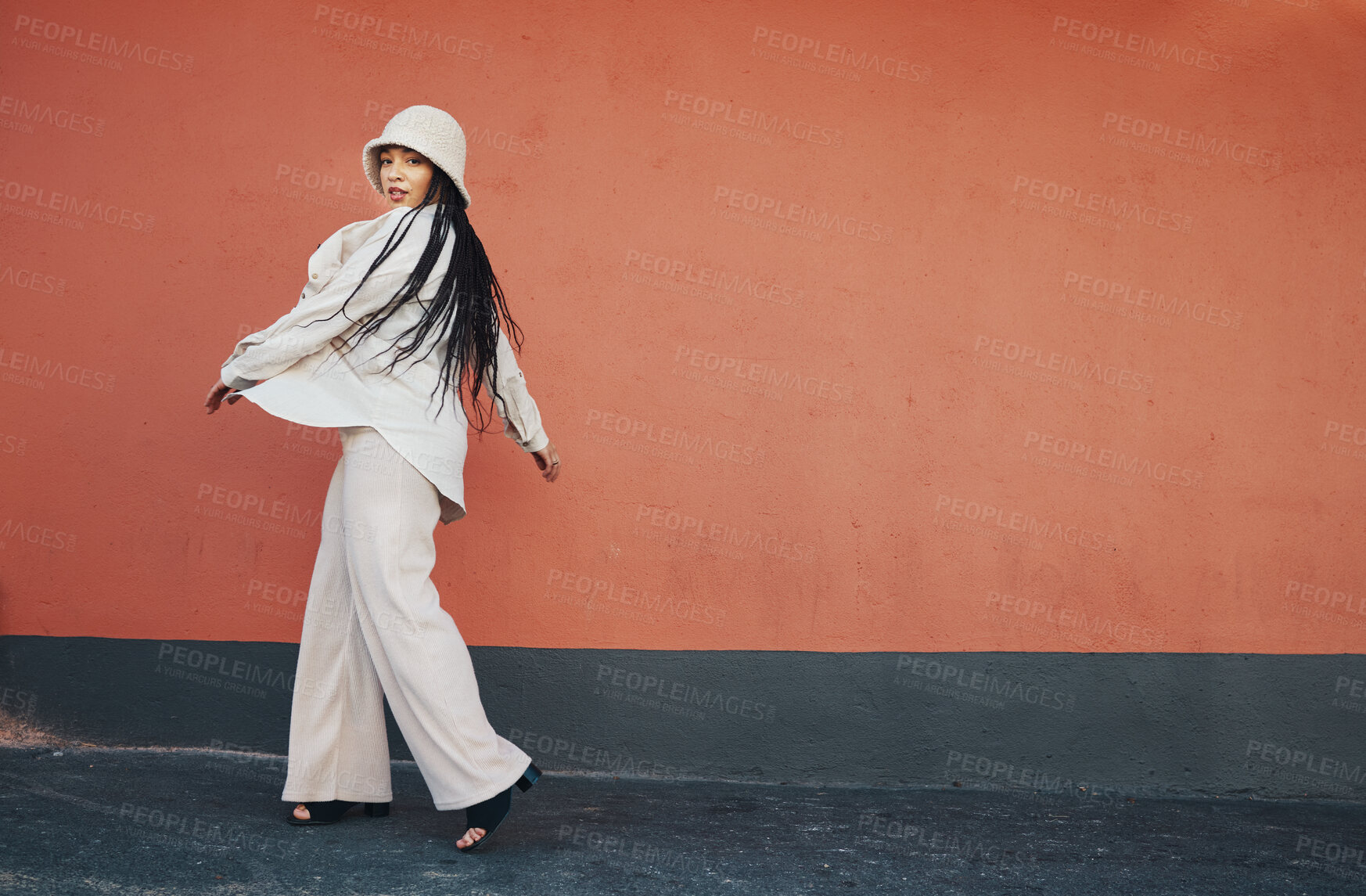 Buy stock photo Woman portrait, fashion and city wall with mockup, hipster style and urban clothes with space. Red background, freedom and stylish female person in town with cool and relax modern outfit outdoor