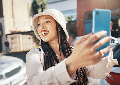 Buy stock photo Happy woman in city with smartphone, travel blog and smile for live streaming on social media for holiday memory. Influencer, streamer or gen z girl with urban fashion, phone and content creation.