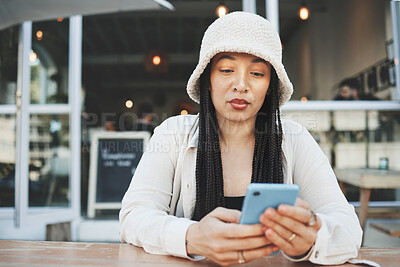 Buy stock photo Phone, woman and reading internet chat with technology and connection at outdoor coffee shop. Smartphone, person and networking or online scroll for information, conversation and texting with network