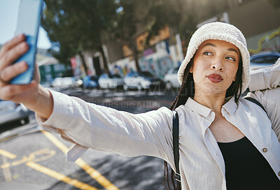 Buy stock photo Woman on street with selfie in city, travel holiday memory and social media in streetwear. Influencer, streamer or gen z girl with urban fashion, photography and content creation for vacation blog.