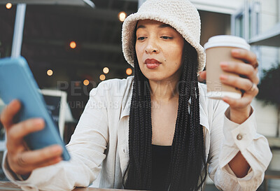 Buy stock photo Phone, networking and woman with a coffee in the city typing a message on the internet. Technology, latte and female person scroll on social media or mobile app with cellphone at restaurant in town.