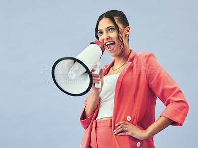 Buy stock photo Megaphone, news and woman in studio with fashion announcement, deal or promo on blue background. Microphone, speech and female speaker with bullhorn for attention, information or voice, vote or info