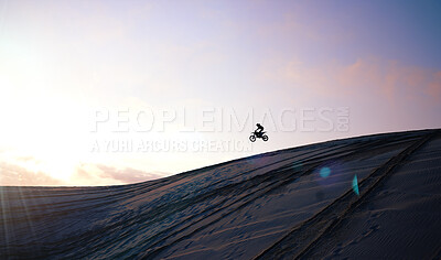 Buy stock photo Motorcycle, person and jump for training or sports with fitness, balance or challenge in nature on mock up space and sky. Bike, freedom and adventure for competition, exercise or talent in desert