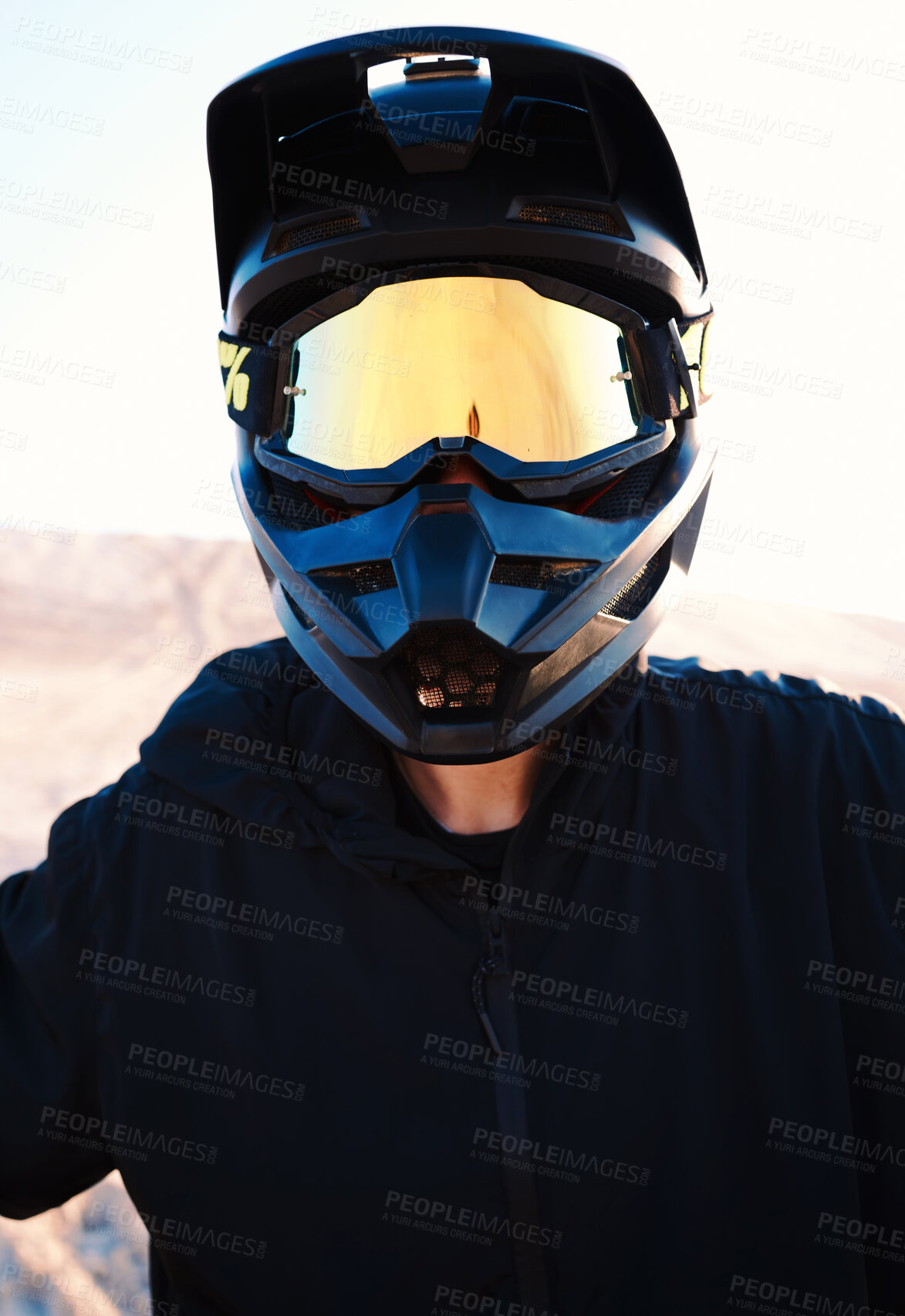 Buy stock photo Helmet, freedom and an off road biker outdoor for a race, competition or adrenaline in summer. Flare, energy and adventure with a sports rider on a course for power or speed in a reflective visor