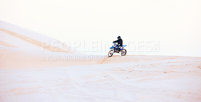 Buy stock photo Desert, hill or athlete driving motorcycle for action, adventure or fitness with performance or adrenaline. Sand, sports or person on dirt motorbike on dunes for training, exercise or race challenge