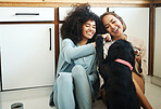 Happy, couple or friends with dog in kitchen, home or relax with coffee, drink and eating breakfast on the floor of apartment. Women, playing and pet or animal in house with love and care for puppy