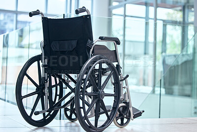 Buy stock photo Healthcare, rehabilitation and a wheelchair at a hospital for support, physiotherapy or disability help. Nursing, medical and equipment or a chair for clinic transportation, recovery or inclusion