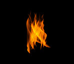 Orange fire, heat and light on black background with texture, pattern and burning energy. Flame, fuel and flare isolated on dark wallpaper design, explosion at bonfire, thermal power or inferno glow.