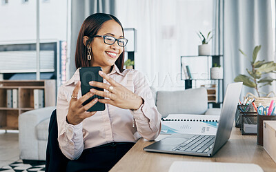 Buy stock photo Smile, laptop and businesswoman with a phone in the office typing an email or networking on internet. Communication, technology and female designer doing creative research on cellphone and computer.