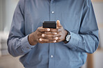 Cellphone, hands and closeup of businessman typing a message on the internet or mobile app. Technology, networking and African male person scroll on social media or website with phone in the office.