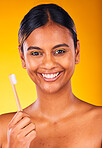 Woman, smile and portrait for dental, toothbrush and teeth for health, happy and hygiene by studio background. Person, treatment and whitening or clean, oral and brushing teeth for wellness in mouth
