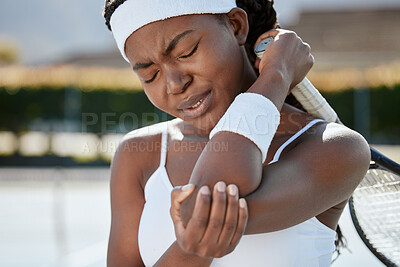 Buy stock photo Black woman, tennis and elbow pain from injury, fitness or outdoor athlete in medical emergency or joint inflammation. African female person or sports player with sore arm, ache or accident in match