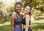 Fitness, smile and portrait of friends in a forest after workout, exercise and outdoor training together with support and care. Happy, nature and women hug in morning ready for wellness teamwork