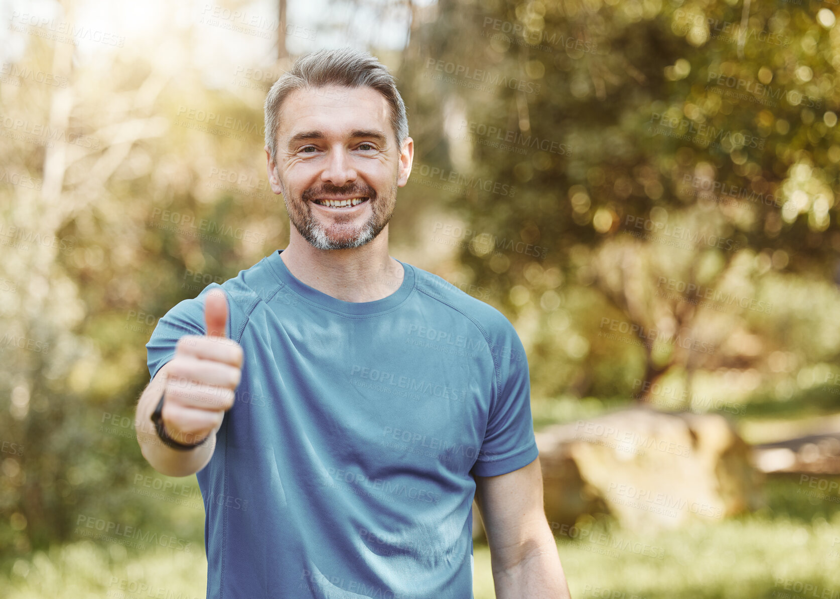 Buy stock photo Senior man, portrait and thumbs up in nature for fitness, training or outdoor workout achievement. Mature male person, athlete or runner smile with like emoji, yes sign or OK in success for exercise