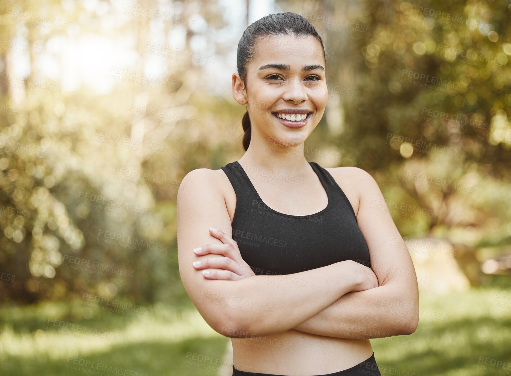 Buy stock photo Portrait, outdoor and woman with fitness, arms crossed and smile with wellness, energy and workout. Face, person and athlete with confidence, forest and training with happiness, health and exercise