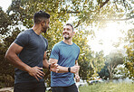 Running team, fitness and men in nature park with cardio, athlete and support for sports and health. Exercise friends, diversity and runner club, healthy and training for race outdoor with workout