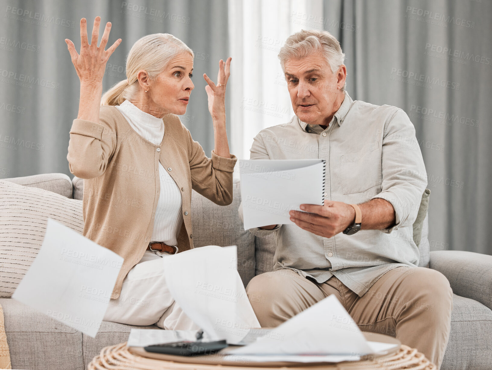 Buy stock photo Debt, old couple with documents and stress in home, mortgage payment and retirement funding crisis. Financial budget, senior man and woman on sofa with anxiety for bills,  life insurance and taxes.