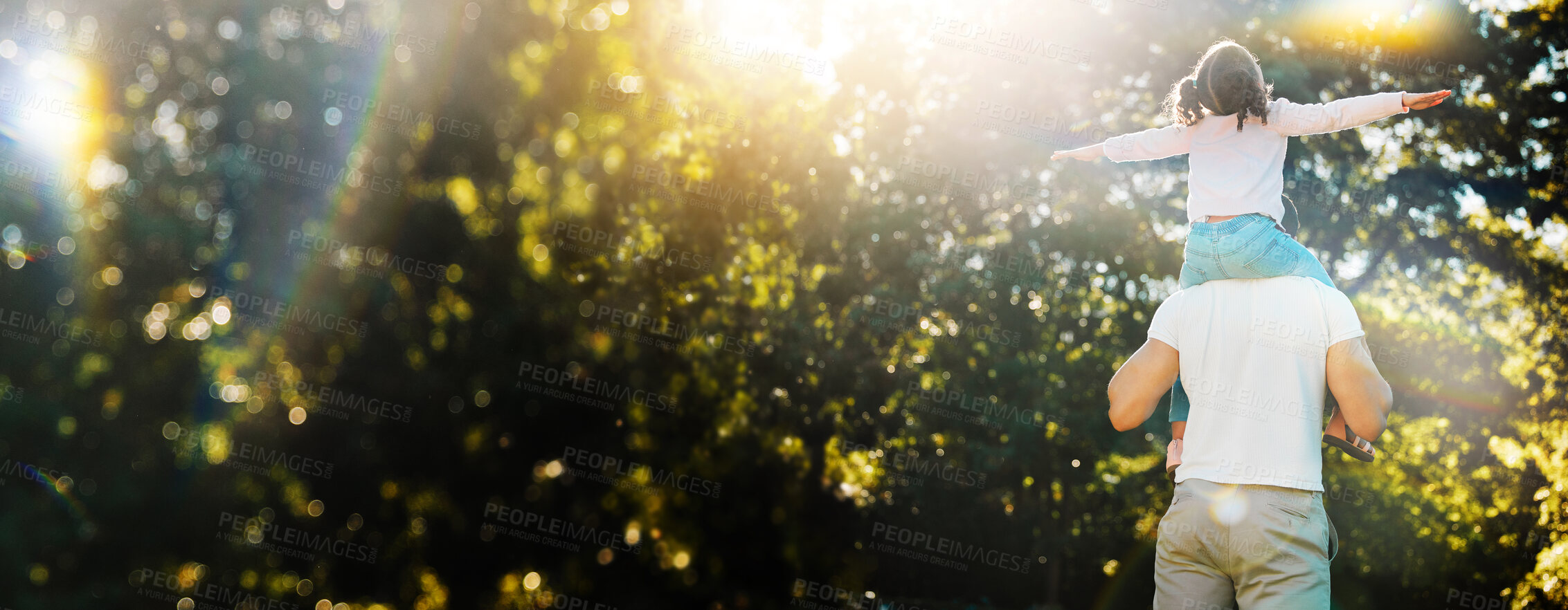 Buy stock photo Piggyback, father and child fly outdoor on banner in nature, support and bonding together on mockup space with bokeh. Dad carrying kid, play in garden and family travel on summer vacation at park