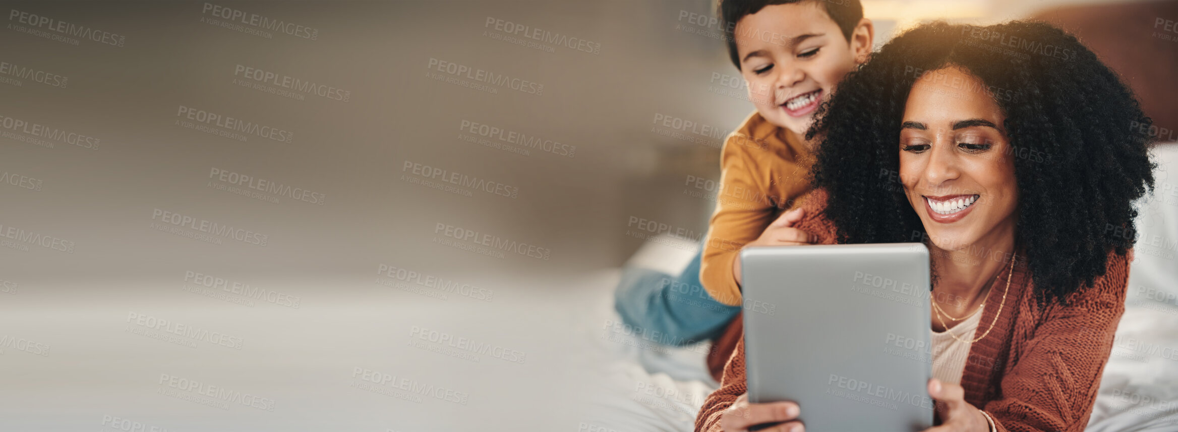 Buy stock photo Love, tablet or mother with child on a bed with mockup, social media or streaming subscription at home. Digital, space and mom with kid son in a bedroom happy, relax and online for movies or games