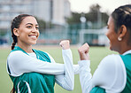 Stretching, arms and athlete in sports, field or soccer with team, women and exercise with happiness outdoor. Football player, woman and training with a smile on face for fitness practice or game