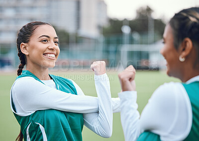 Buy stock photo Stretching, arms and athlete in sports, field or soccer with team, women and exercise with happiness outdoor. Football player, woman and training with a smile on face for fitness practice or game