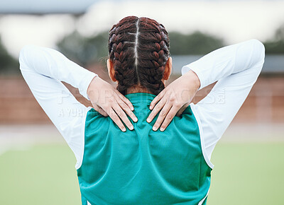 Buy stock photo Athlete, field or sports woman with back pain in exercise, body training injury or outdoor workout. Girl, stress or injured female hockey player with burnout, accident or muscle problem emergency 