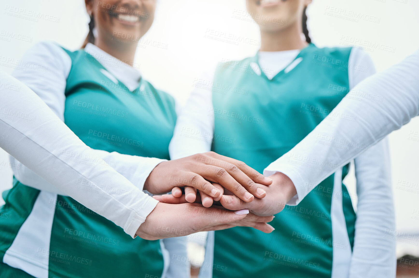 Buy stock photo Hands, sports women or team in huddle with support, smile or plan for a hockey training game. Low angle, stack or happy female athletes in practice for exercise or match together with pride or unity