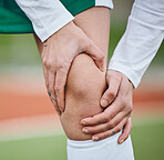 Sports, knee pain or athlete with an injury on field or turf struggling with fracture in game or match. Fitness workout, emergency or closeup of person suffering from an accident outdoor in training