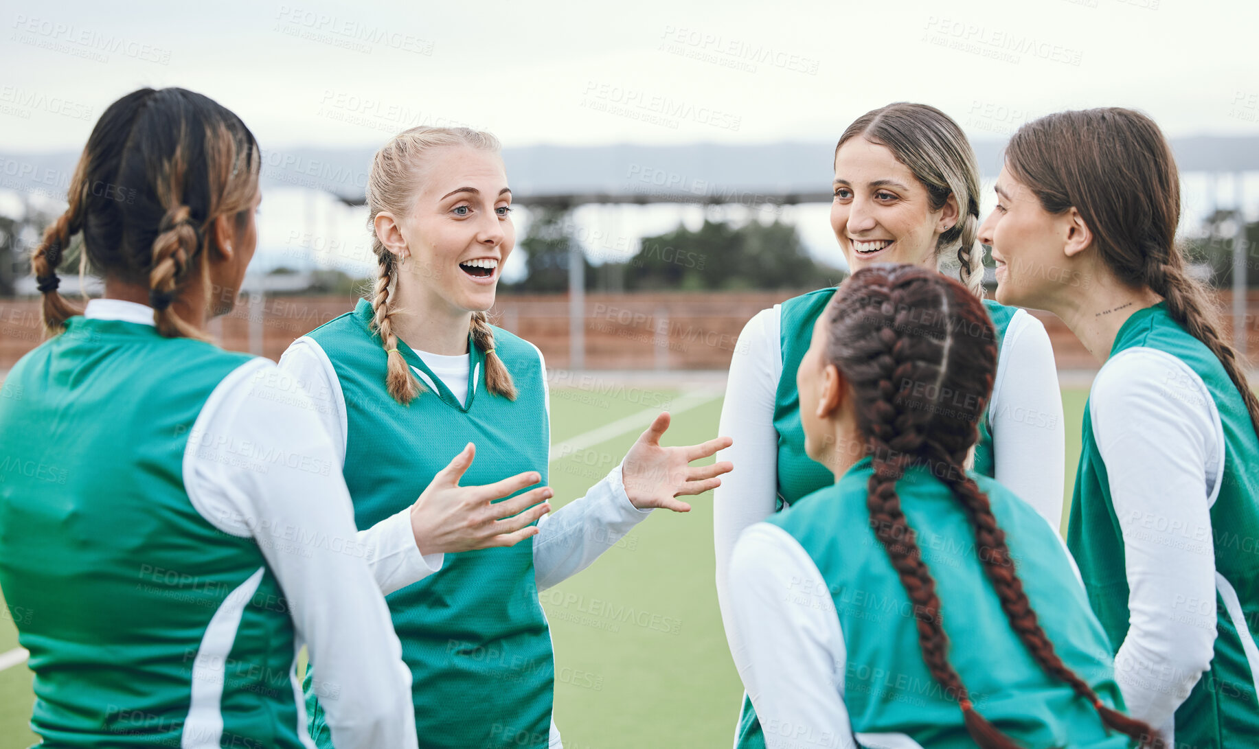 Buy stock photo Sports, hockey team and women talking outdoor at field together for competition training. Fitness, happy group of girls and collaboration for workout, exercise for healthy body and planning strategy