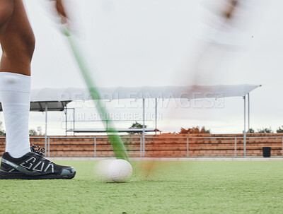 Buy stock photo Person, legs and hockey stick on field, ball with speed or motion for sports goal, training or professional game. Action, feet and turf with performance for outdoor competition, fitness and exercise 