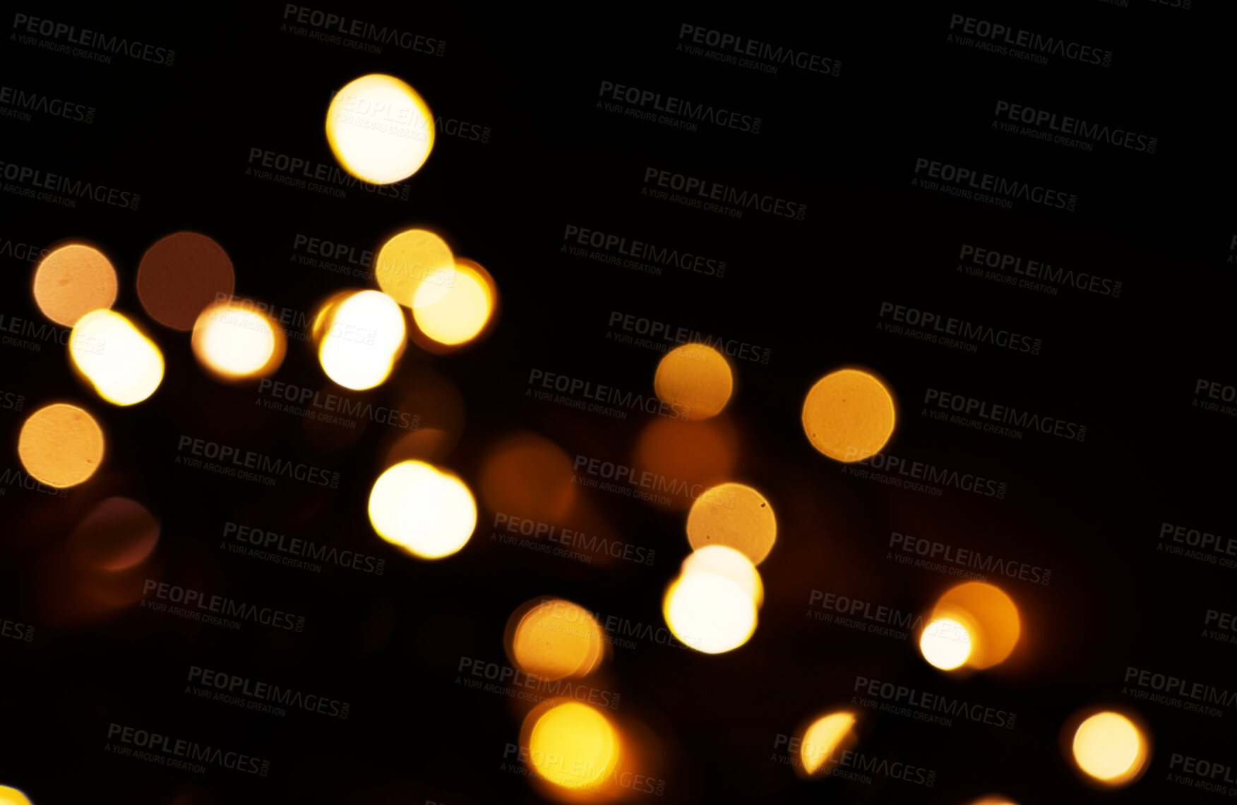 Buy stock photo Gold, bokeh and light in a studio with a dark background for celebration, event or party. Mockup, confetti and yellow for glow, magic or shine for festive decoration by a black backdrop with mock up.