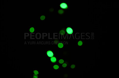Buy stock photo Green light, bokeh and dots on dark background on a mockup space. Blur, black backdrop and defocused shine, sparkle or glitter glow at night for Christmas, holiday or party with magic color wallpaper