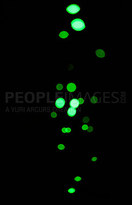 Bokeh, green dots and light on black background with pattern, texture and mockup with cosmic aesthetic. Night lighting, sparkle particles and glow on dark wallpaper with space, color shine and flare.