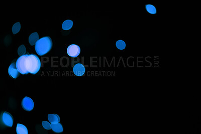Bokeh, blue dots and mockup on black background with pattern, texture and lights with cosmic aesthetic. Night lighting, sparkle particles and glow on dark wallpaper with space, color shine and flare.