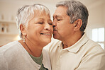 Kiss, smile and senior couple in home with love, support and portrait of marriage in retirement together. Digital photography, face of happy man and old woman in apartment to post on social media.