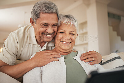 Buy stock photo Home, video call and senior couple with a tablet, speaking and greeting with conversation, connection and speaking. Internet, old man and happy elderly woman with technology, digital app and hug