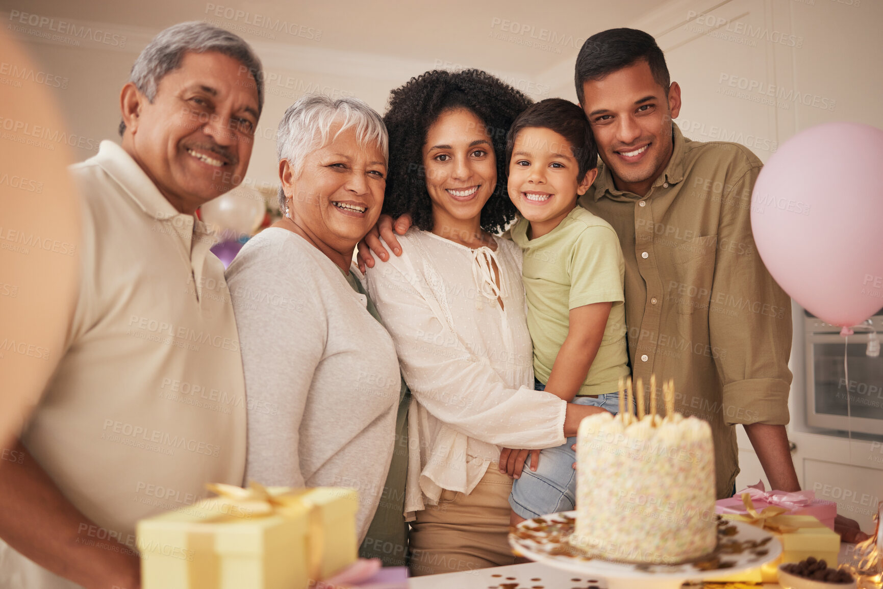 Buy stock photo Birthday cake, child and family portrait with grandparents for celebration, party and parents, love and care. Happy interracial people, boy kid and balloon, present or gift and dessert for holiday