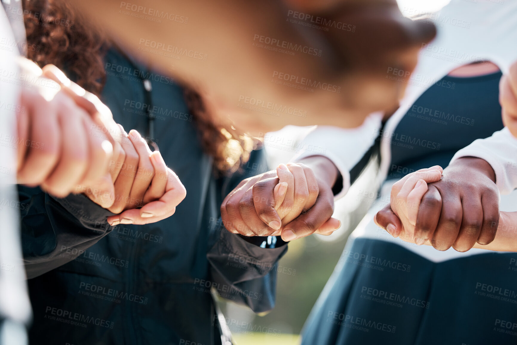 Buy stock photo Cheerleader support, team holding hands and group prayer for help, care and community faith in sports contest solidarity. Cheerleading trust, athlete religion and closeup dancer pray for performance