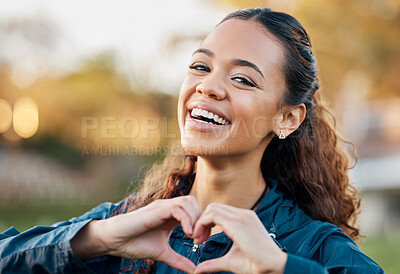 Buy stock photo Happy woman, portrait smile and heart hands in nature, fitness or love and care for outdoor sports. Female person or athlete showing romantic emoji, sign or gesture in support for health and wellness
