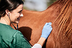 Vet, stethoscope and horse farm with wellness, healthcare and support with animal in countryside. Nurse, woman and helping with heart rate and monitoring outdoor with a smile and happy from nursing