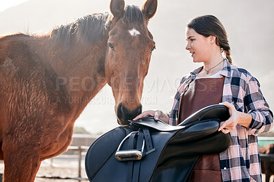 Horse, rider and woman with saddle on ranch for animal care, training and riding on farm. Agriculture, countryside and person with equipment for stallion for practice, freedom and adventure outdoors