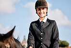 Portrait, horse riding and a woman with an animal on a ranch for sports, training or a leisure hobby. Equestrian, smile or competition and a happy young rider in uniform with her stallion outdoor