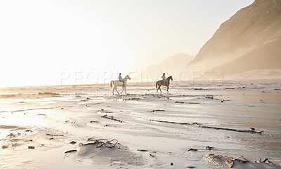 Buy stock photo Woman, friends and horse riding for sport at beach with back view while traveling on vacation, trip or wellness. People, together and race for bond, self care and adventure on holiday with sunset 