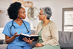 Bible, religion and assisted living caregiver with an old woman in a retirement home together. Healthcare, christian faith or belief with a nurse or volunteer reading to a senior patient in a house