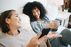 Phone, coffee and lesbian couple on bed in conversation for bonding, relaxing and resting together. Happy, communication and young lgbtq women networking on cellphone with latte in bedroom at home.